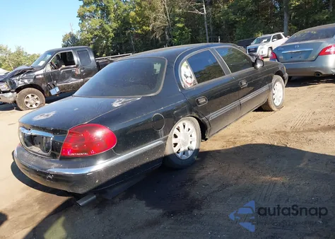 1999 Lincoln Continental z USA, uszkodzony, nr VIN 1LNHM97V7XY609915